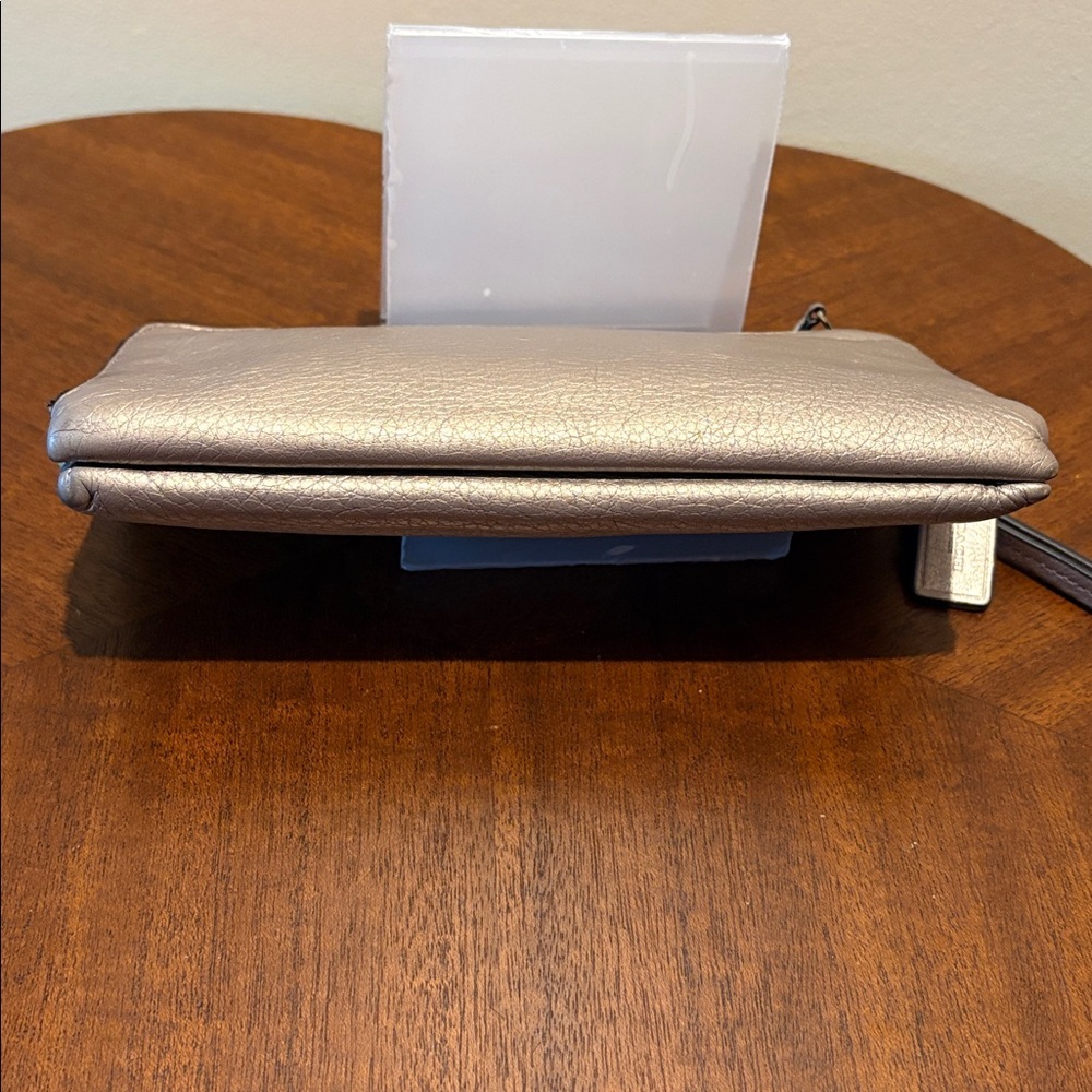 Coach  Double zip wristlet  pebbled Leather  gold metallic  long wallet 8”w
EUC - Picture 9 of 17